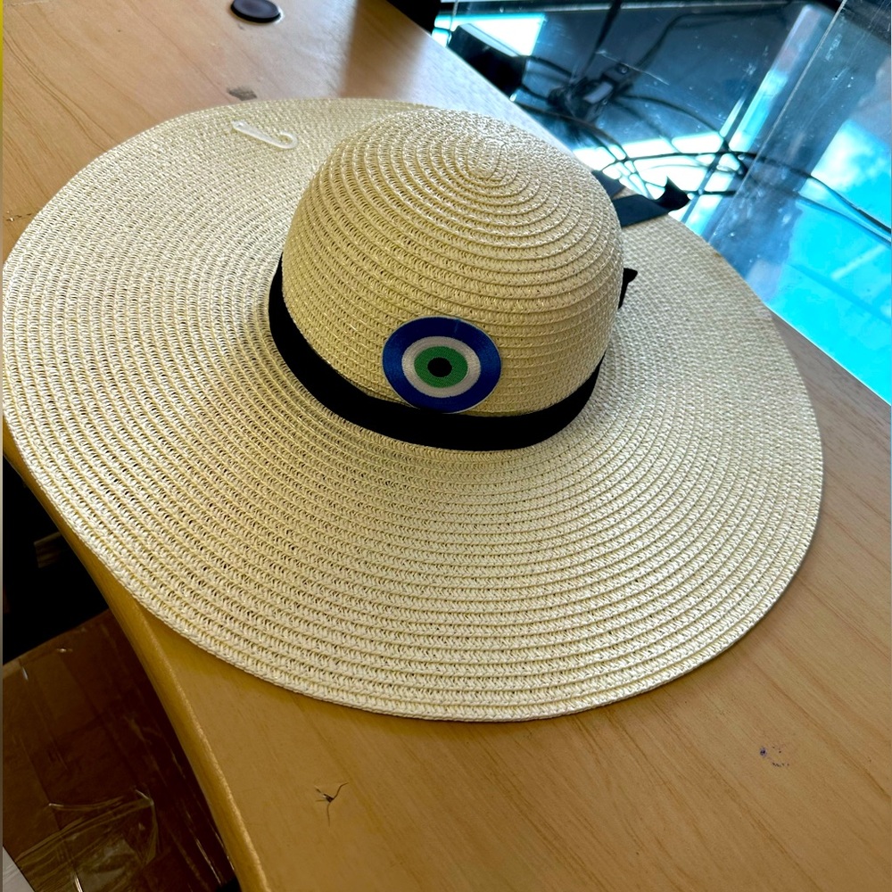 Stylish Cream Wide-Brim Hat with Blue Accent